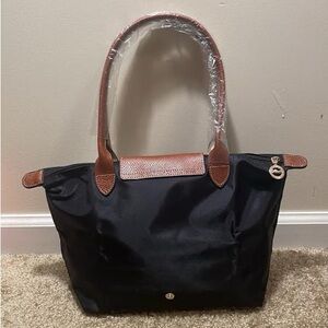 Longchamp medium le pilage